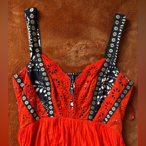 This image features the Free People Bossa Nova Eyelet High Low Dress - Picture 4 of 13